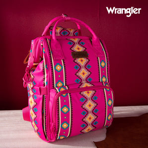 A hot pink Wrangler canvas backpack with Aztec pattern print, featuring leather logo, multiple pockets, and adjustable shoulder straps.