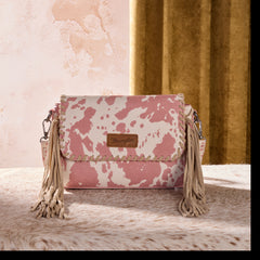 WG444-1818DPK  Wrangler Cow Print Fringe Crossbody Bag - Dark Pink
