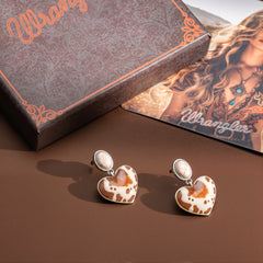 WGE-1129S  Wrangler Silver Cow Print Heart Shape Dangling Earrings - Beige
